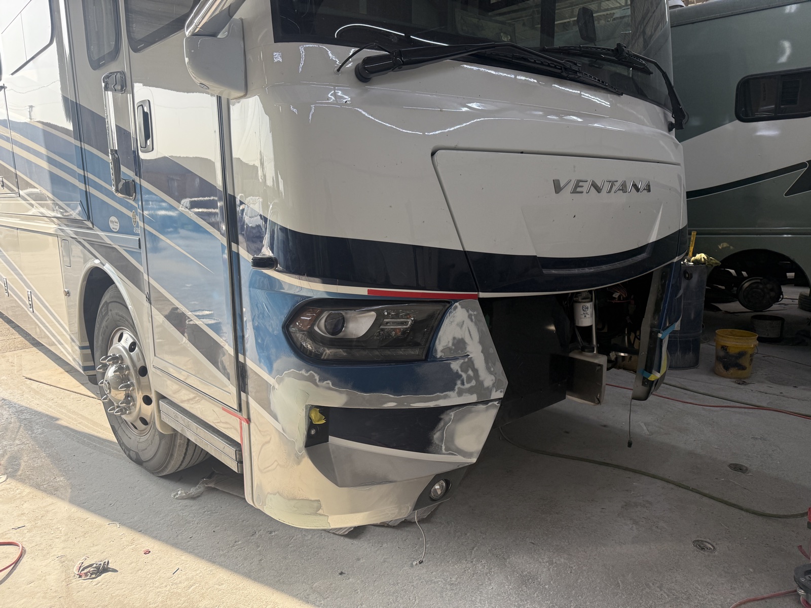 Newmar Ventana motorhome during fiberglass and body repair at Edem Body Shop