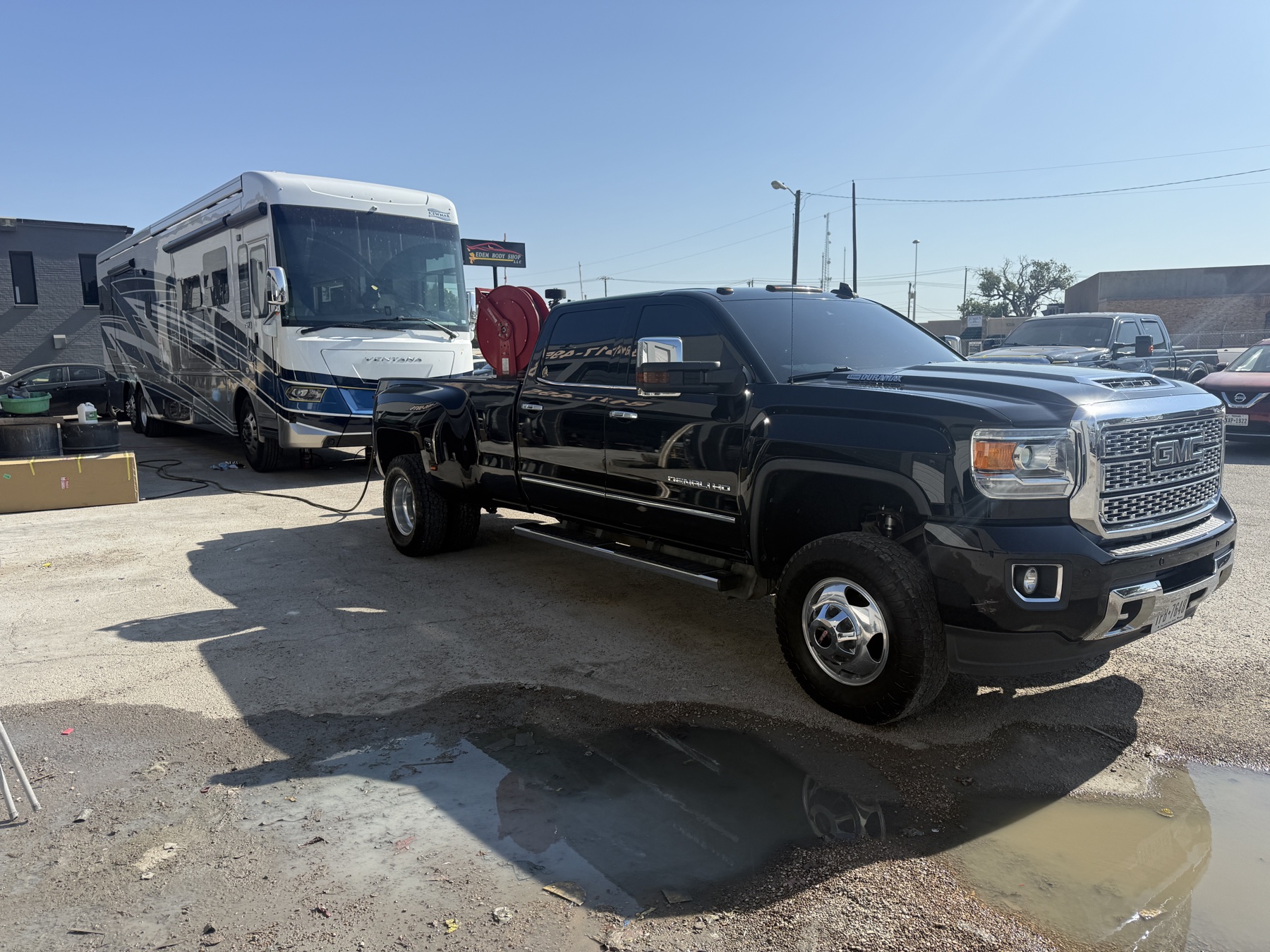Edem mobile service truck beside a Class A motorhome in Fort Worth